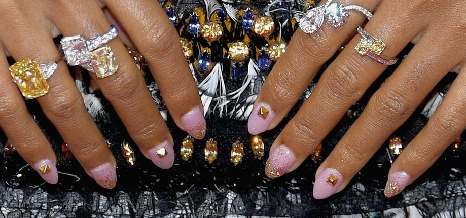 incorporating rhinestones and gems into your nail art